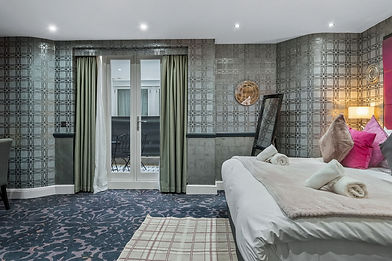 Luxury traveller accommodation in London suite with balcony.
