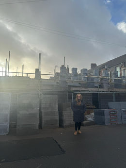 Person standing in front of Project Penarth construction site