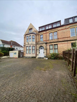 The Project Clive Crescent building exterior and driveway.