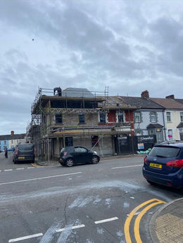 Building under renovation with scaffolding in Penarth
