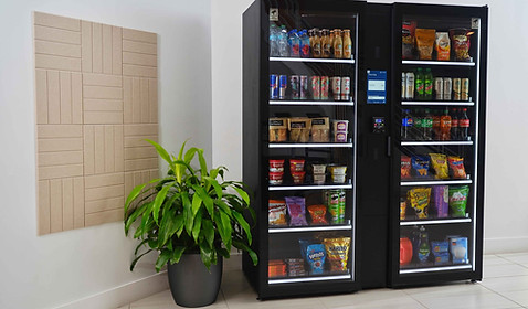 Smart grab-and-go cooler in clean office lobby