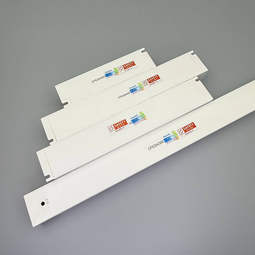 Four 24V Philips power supply units in varying sizes.