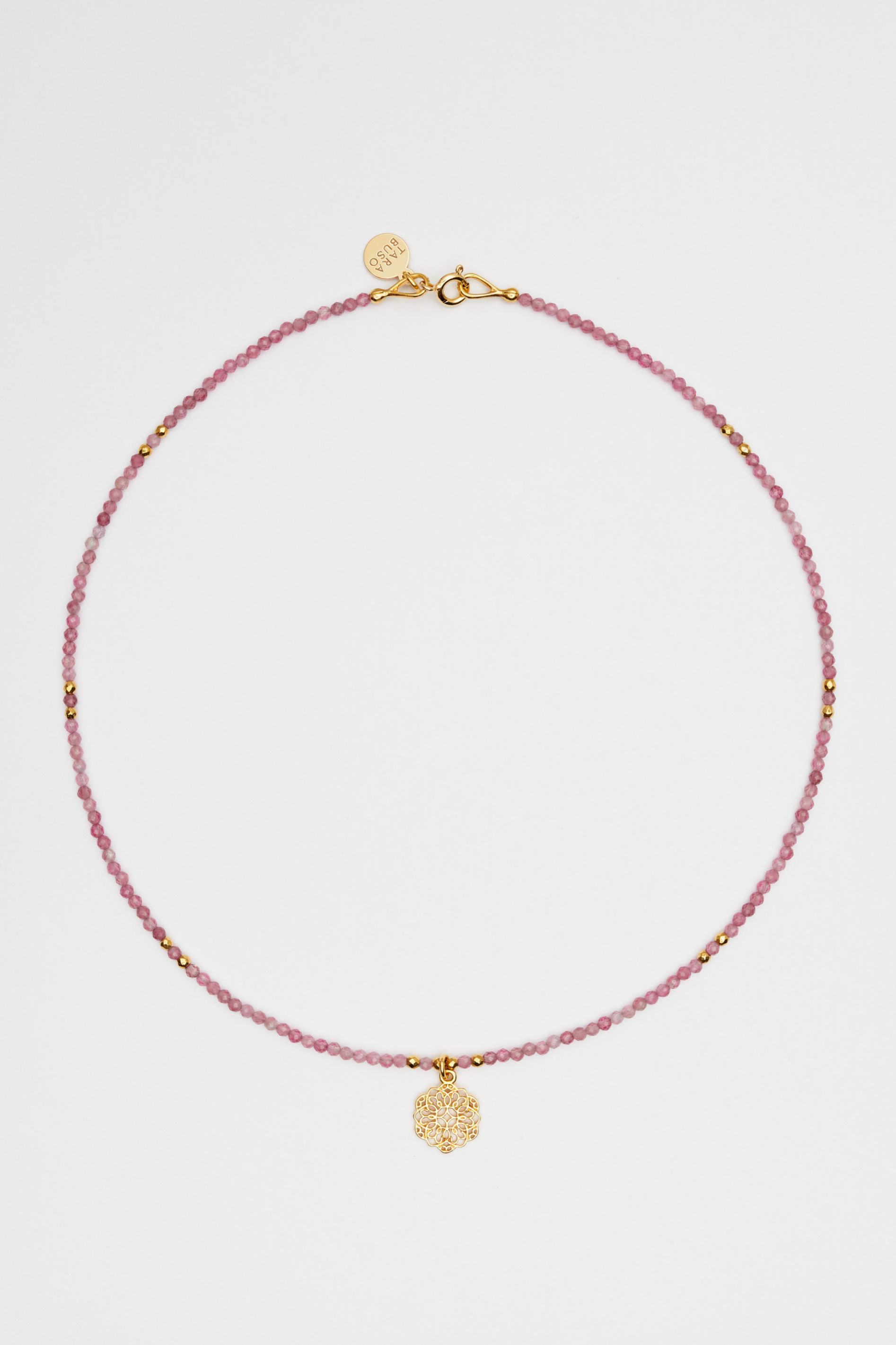 Naszyjnik z różowym turmalinem i ażurową zawieszką