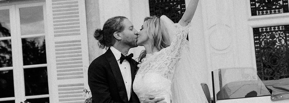 International couple celebrating a luxury wedding experienced with confidence and peace of mind