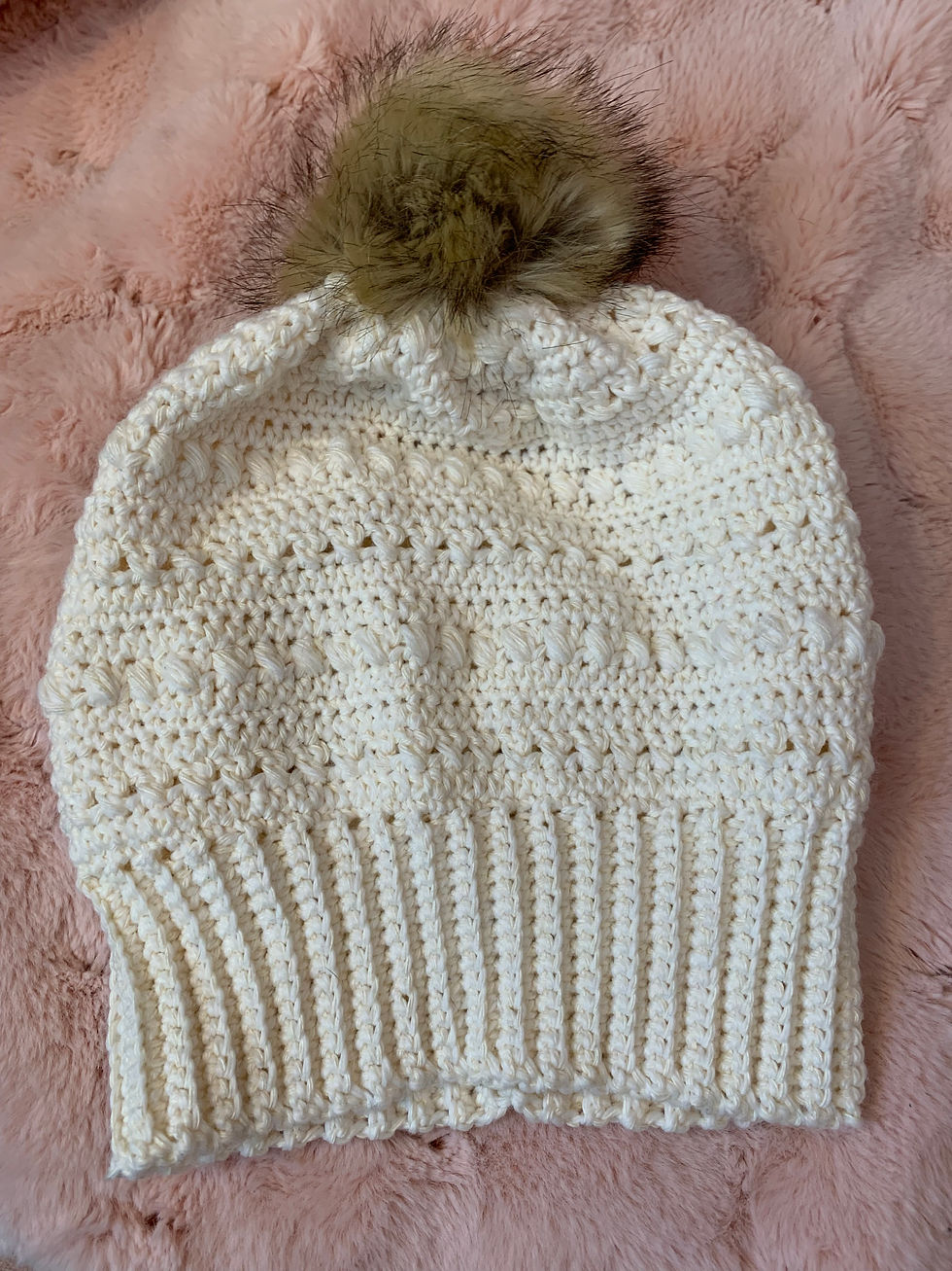 Cream hat with pom