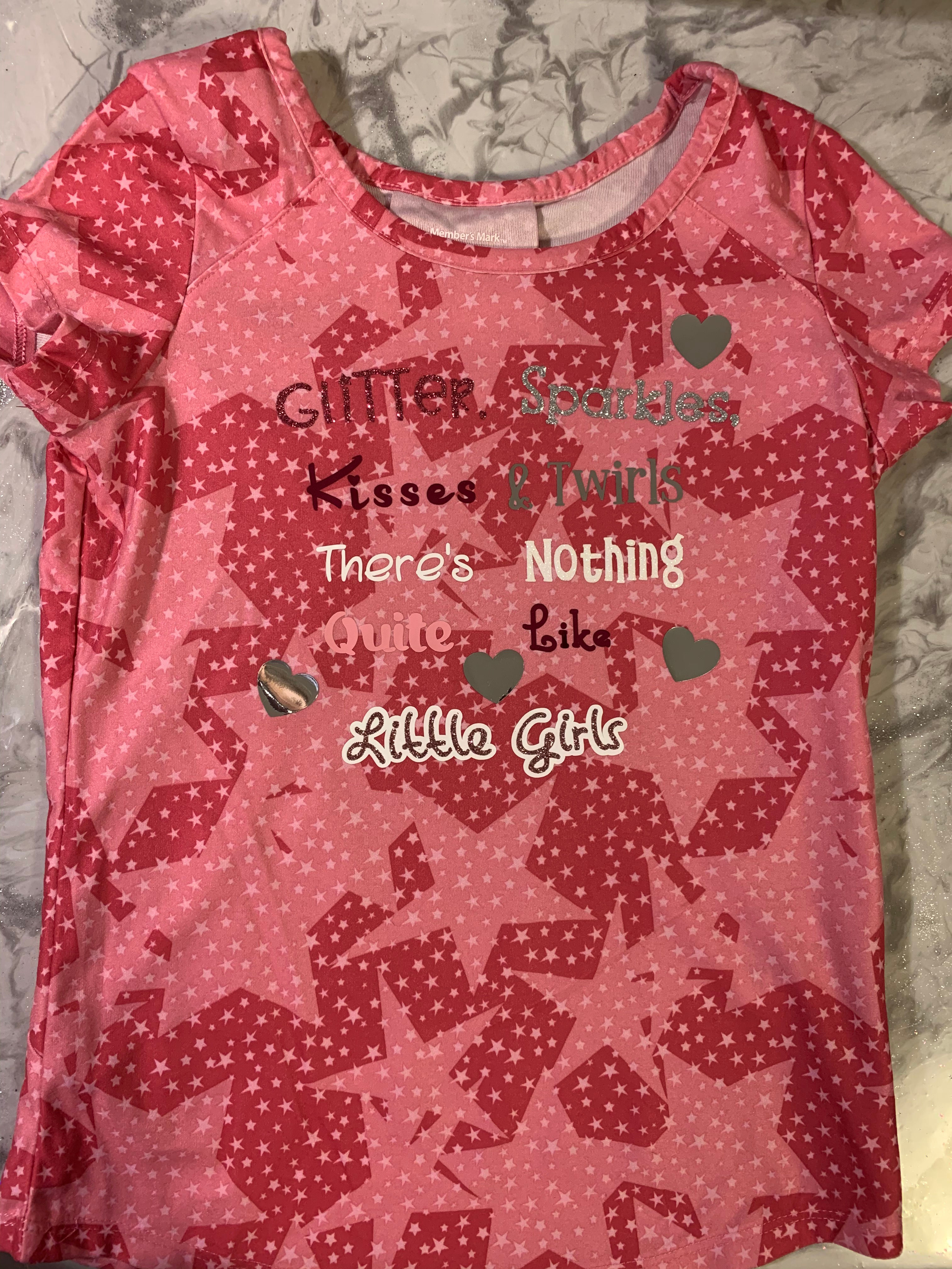 Glitter, sparkle, kisses & twirls, there's nothing quite like little girls tee