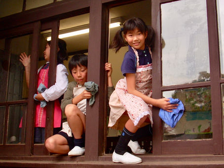 Happy Children Clean their School