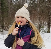 Enjoying sugar on snow!