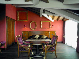 Elegant bedroom suite with ornate furniture