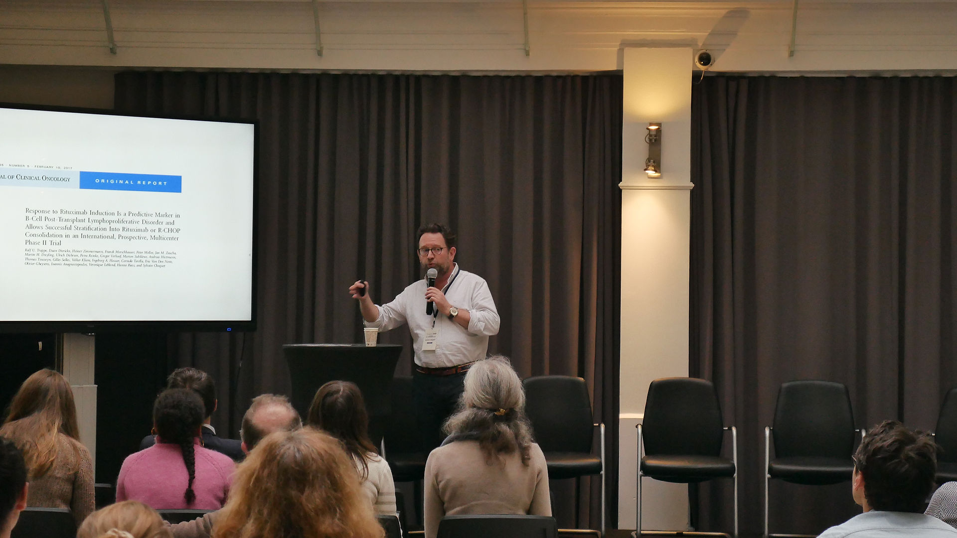 Le Dr Sylvain Choquet présentant l'historique et les succès du réseau CANCEROGREF (ex K-VIROGREF) lors du congrès CANCERIMMUNE