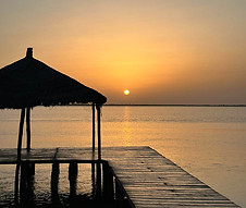 Coucher de soleil sur l'eau au Sénégal