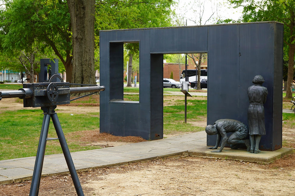 At Kelly Ingram Park, sculptures recreate the brutal force used against civil rights demonstrators in 1963. A mounted fire hose stands aimed at two students — a boy and a girl — capturing the reality of high-pressure water used as a weapon under Commissioner “Bull” Connor. This installation does not interpret history; it confronts it, placing viewers in the line of fire at the very ground where peaceful protest, often led by children, met sanctioned violence. JavarJuarez©2026