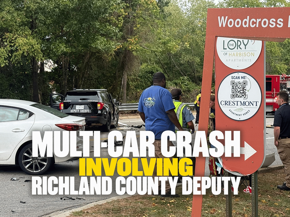 Multi-Vehicle Crash on Harbison Boulevard: A Richland County Sheriff's Department patrol vehicle sits damaged near the Woodcross Drive intersection Friday morning, October 9, 2026, as emergency responders investigate the collision involving multiple vehicles. JavarJuarez©2026