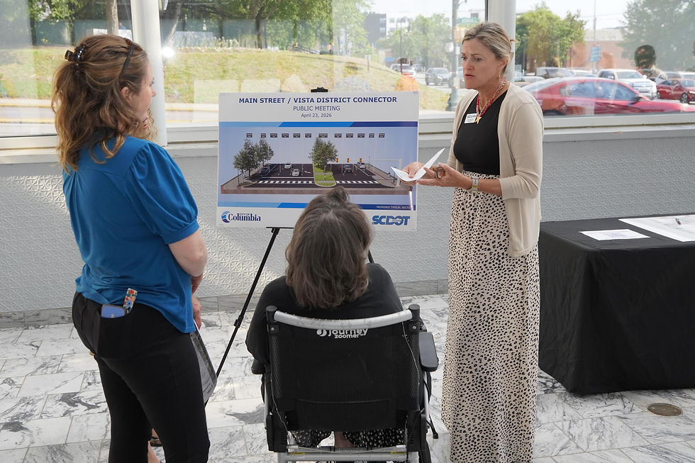 City officials discuss the Main Street/Vista Connector plans with residents, highlighting the importance of ADA accessibility and inclusive design in improving pedestrian safety for all. JavarJuarez©2026