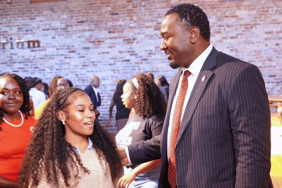Dr. Jermaine Johnson speaks with a student at Claflin University’s historic Ministers’ Hall after an education panel featuring Rahm Emanuel. JavarJuarez©2026