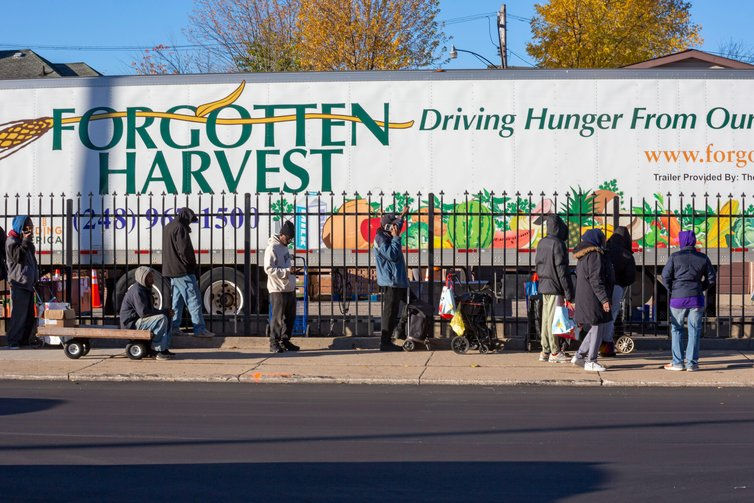 Detroit, Michigan USA - 4 November 2025 - People wait in line to pick up groceries from the anti-hunger nonprofit, Forgotten Harvest./CUBNSC