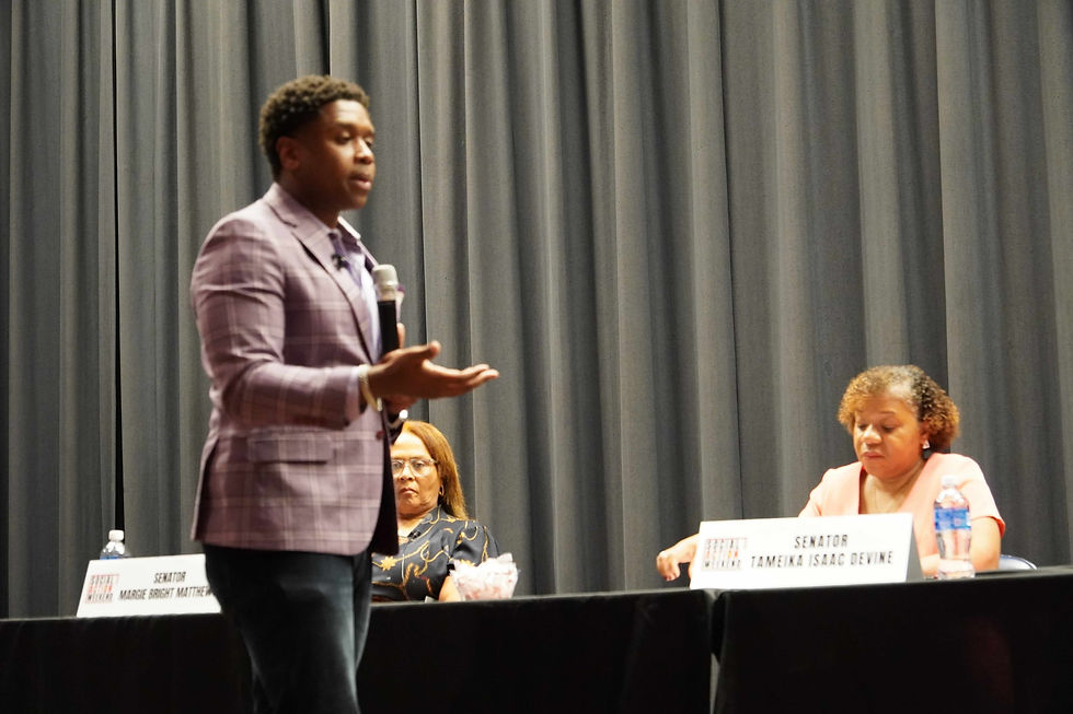 Antwan Seawright Poses question to Rep. Joe White at Social Action Weekend held at Newberry High School