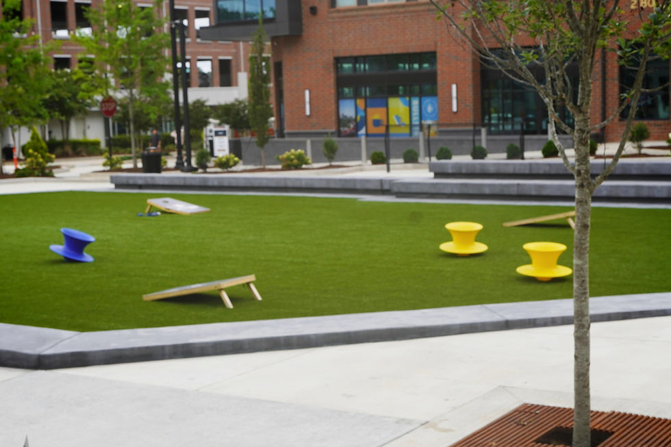 The Lawn outside Coastal Crust offers open space, lawn games and seating in the BullStreet District. JavarJuarez©2026