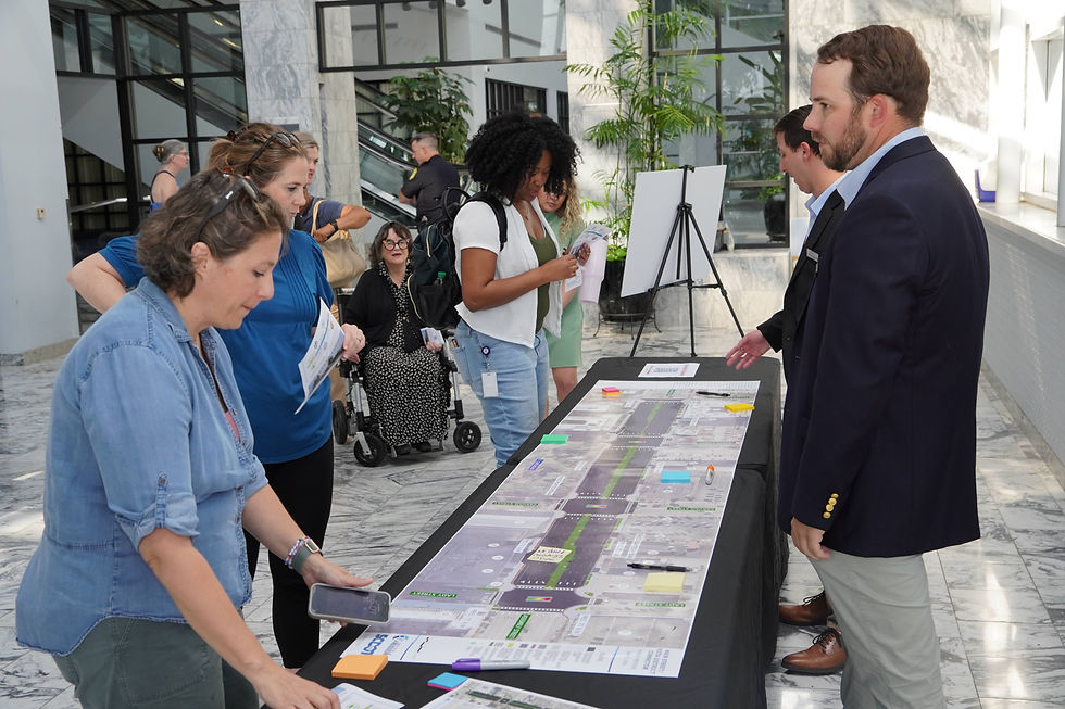 Residents review detailed plans for the Main Street/Vista Connector project during the public meeting, examining the full scope of proposed changes to Assembly Street. JavarJuarez©2026