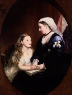 a middle aged white woman dressed in black looking down at a young girl.