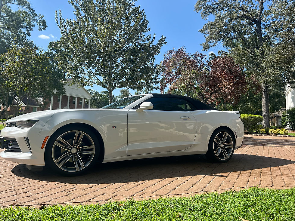 Professional mobile car detailing on white Chevrolet Camaro in Angleton TX