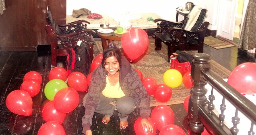 Playing with the balloons at the hotel.