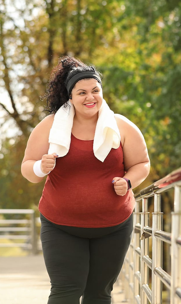 Overweight lady jogging