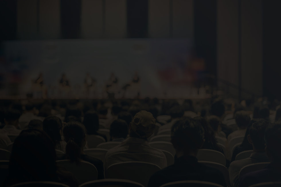 rear-view-audience-listening-speakers-stage-conference-hall-seminar-meeting.jpeg