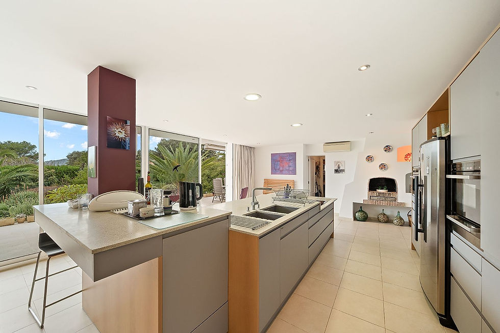 Open kitchen with wooden cabinetry, Costa de los Pinos villa