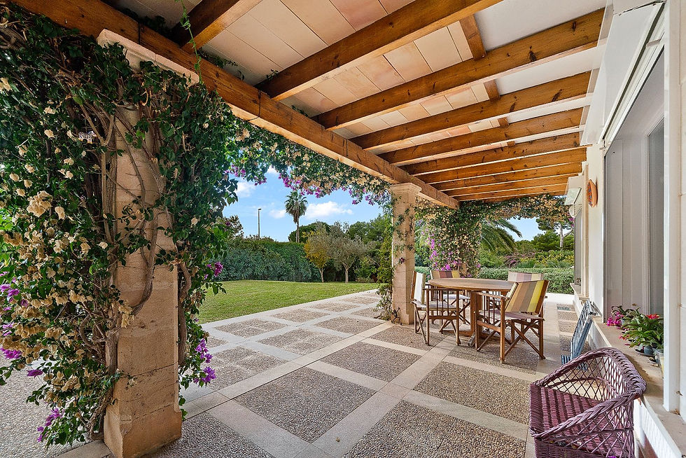 Outdoor dining area under a wooden pergola, Costa de los Pinos villa
