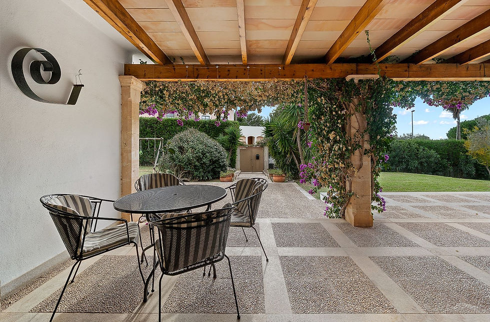 Outdoor dining area under a wooden pergola, Costa de los Pinos villa
