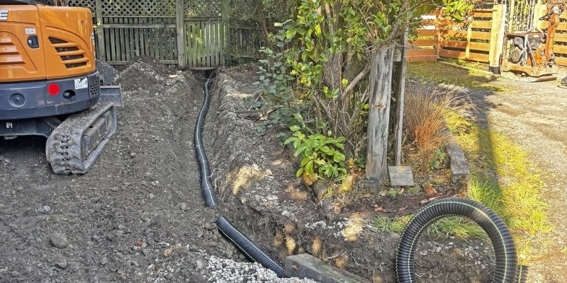 Digger Worx Installing the drainage pipe for drainage installation in invercargill nz