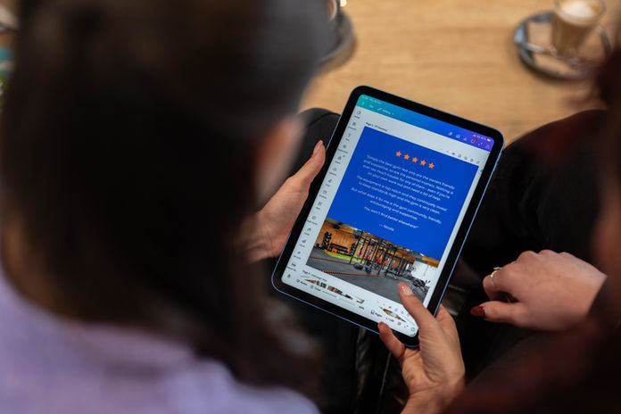 Social media marketeer checking social post visual