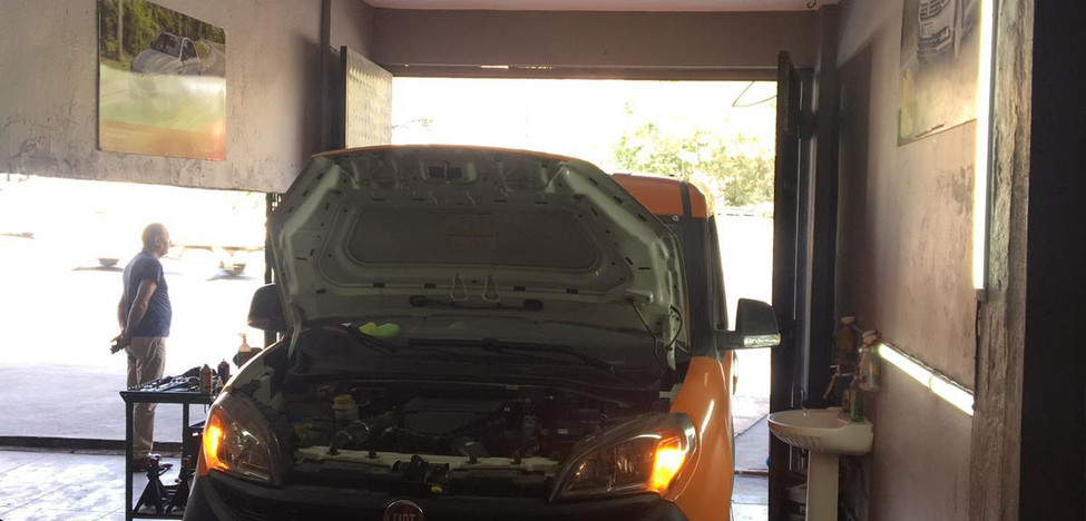 paşaoğlu araç bakım servisi periyodik bakım ve akü değişimi mağaza içinde