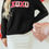 Thumbnail: Black XOXO Glitter Print Round Neck Casual Sweater