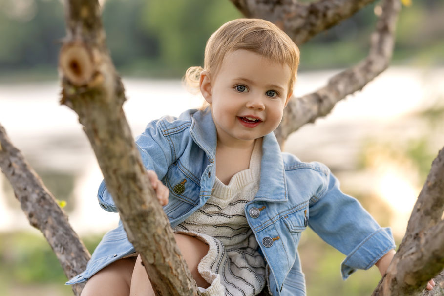 Toddler girl in tree