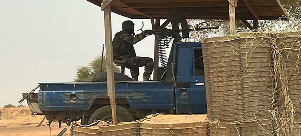 A Nigerien soldier guards a strategic location in Ouallam, Niger