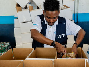 Food is packed for distribution to people affected by Hurricane Melissa in Jamaica
