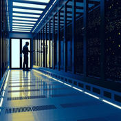 A technician works in a data service centre.