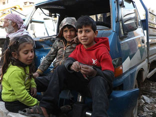 Children are amongst the people who have returned to Idleb in Syria