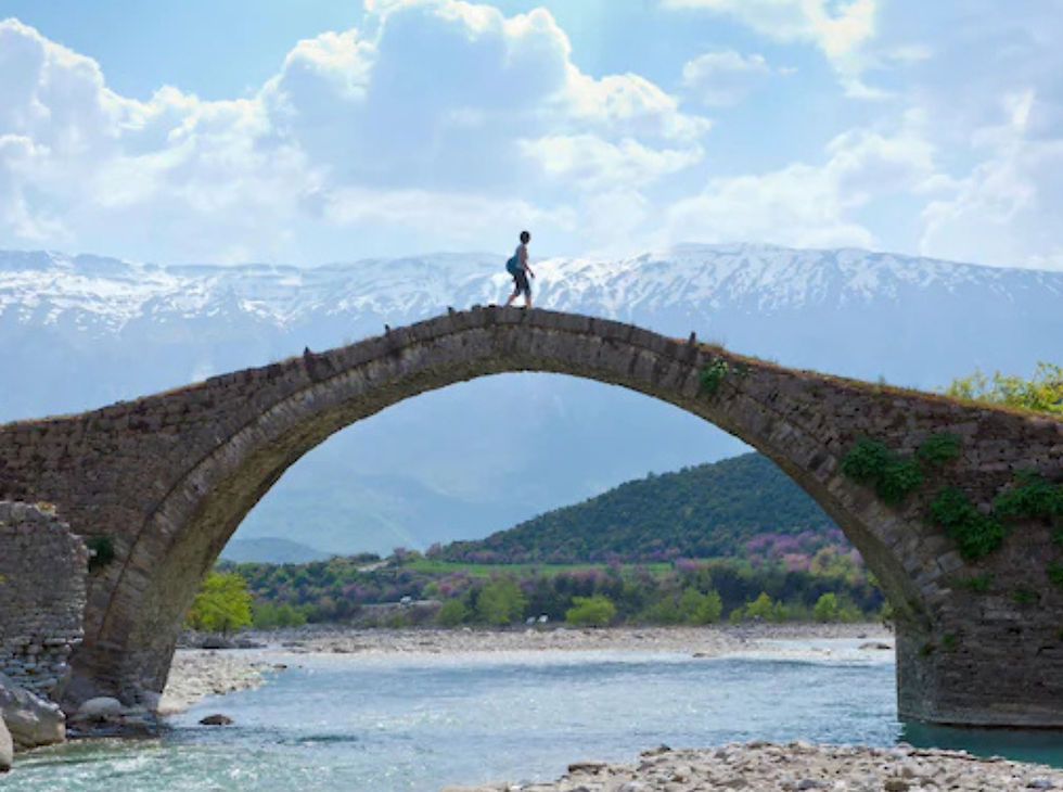 Runners on rugged mountain trails and near crystal-clear lakes in Albania on a 2026 trail running holiday trail running Albania, European running holiday, guided running trip, multi-day trail running, adventure running holiday, 2026 running holidays