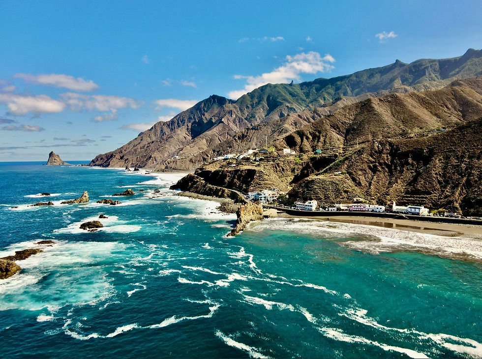 Trail runners above the clouds in Teide National Park on a winter running holiday and trail running adventure in Tenerife.