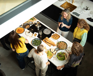 Women gathered around a table at a Cello Wealth workshop