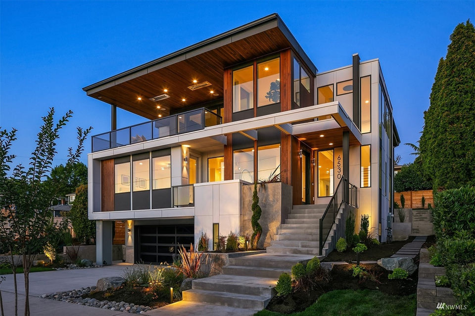 Exceptional view home in sought after Lakeview Terrace--towering above the street to maximize lake and mountain views. Thoughtful detail and quality of construction with extensive steel framing to create a flawless west-facing great room open to chef’s kitchen equipped with a 60” Sub-Zero fridge, 48” Wolf range, dual dishwashers, and an oversized pantry. 3 ensuites including a well-appointed primary suite with 5 pc bath. Lower level features an exercise room/wine cellar as well as 4th bedroom and media room wired for surround sound. Oversized 3 car garage provides ample parking + storage for all your toys. Never miss a sunset from the expansive top-floor deck. Short walk to waterfront, Met Market, Lakeview elementary and CKC.