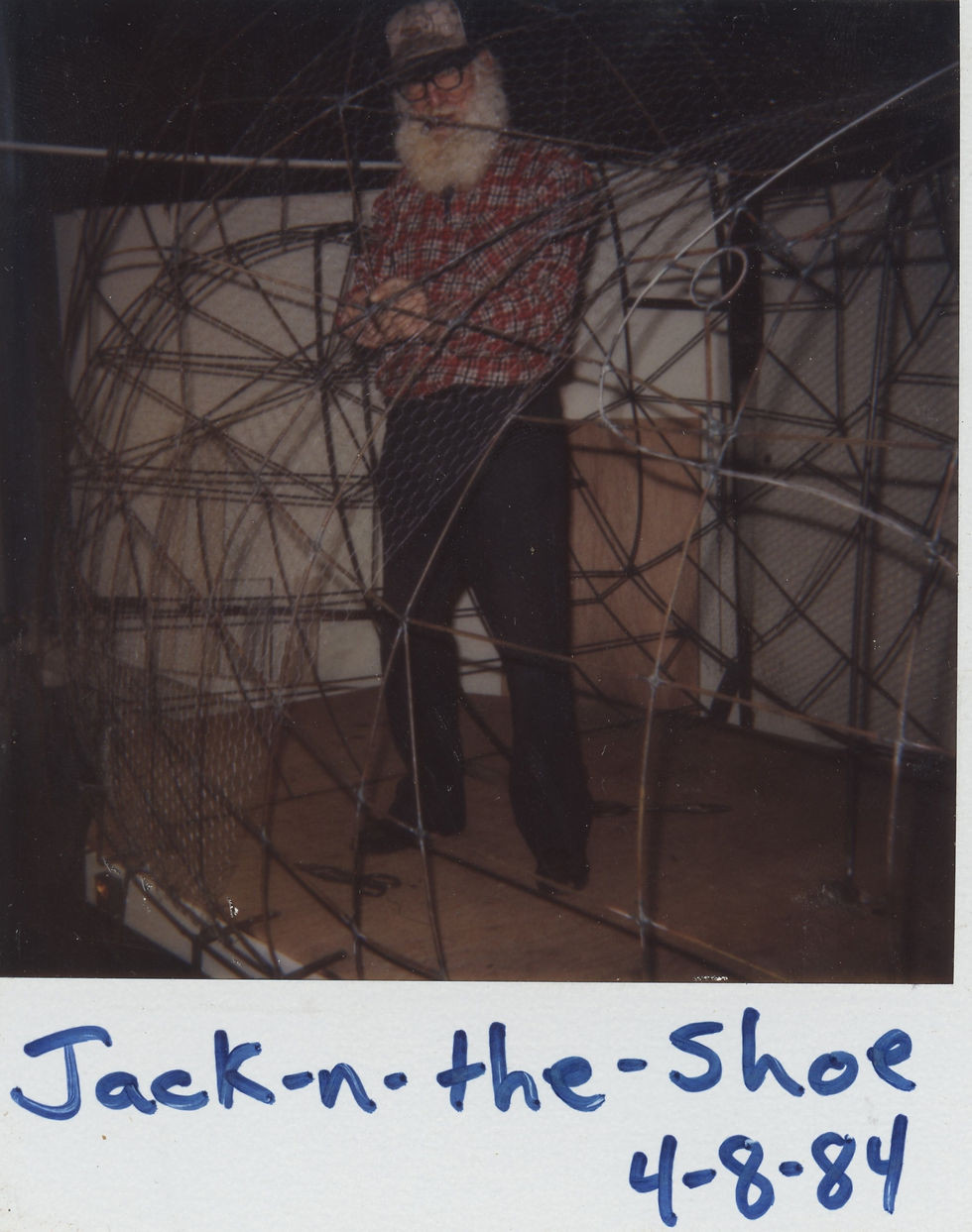 Jack working inside the frame of the giant shoe, 1984.