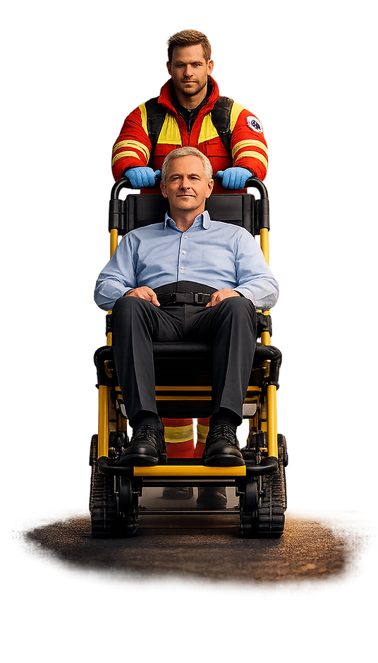 Paramedic pushing a man on an evacuation chair during emergency evacuation