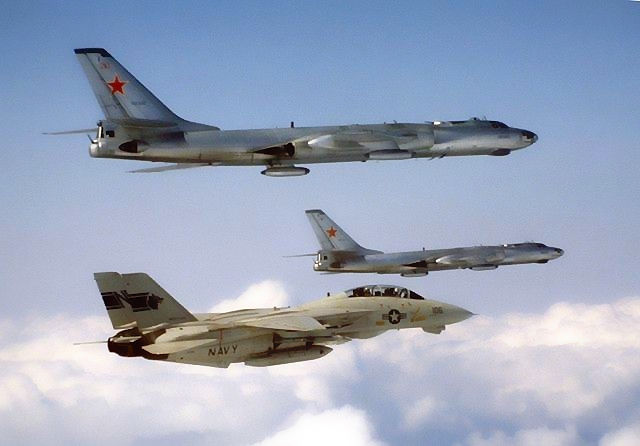 Tomcat of VF-1 Escorting Two Tu-16 Badgers in 1984