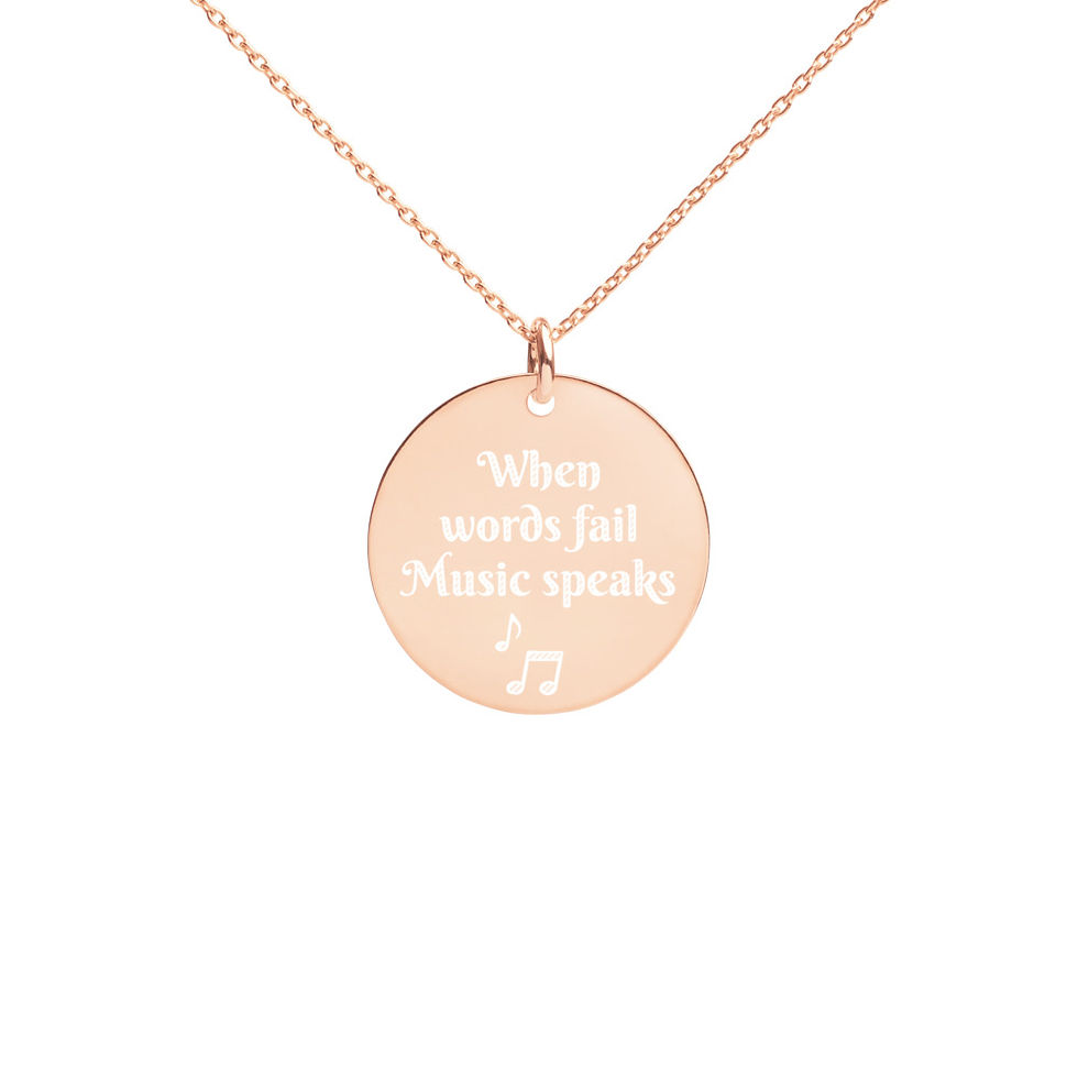 Thumbnail: Engraved Silver Disc Necklace "When words fail Music speaks"
