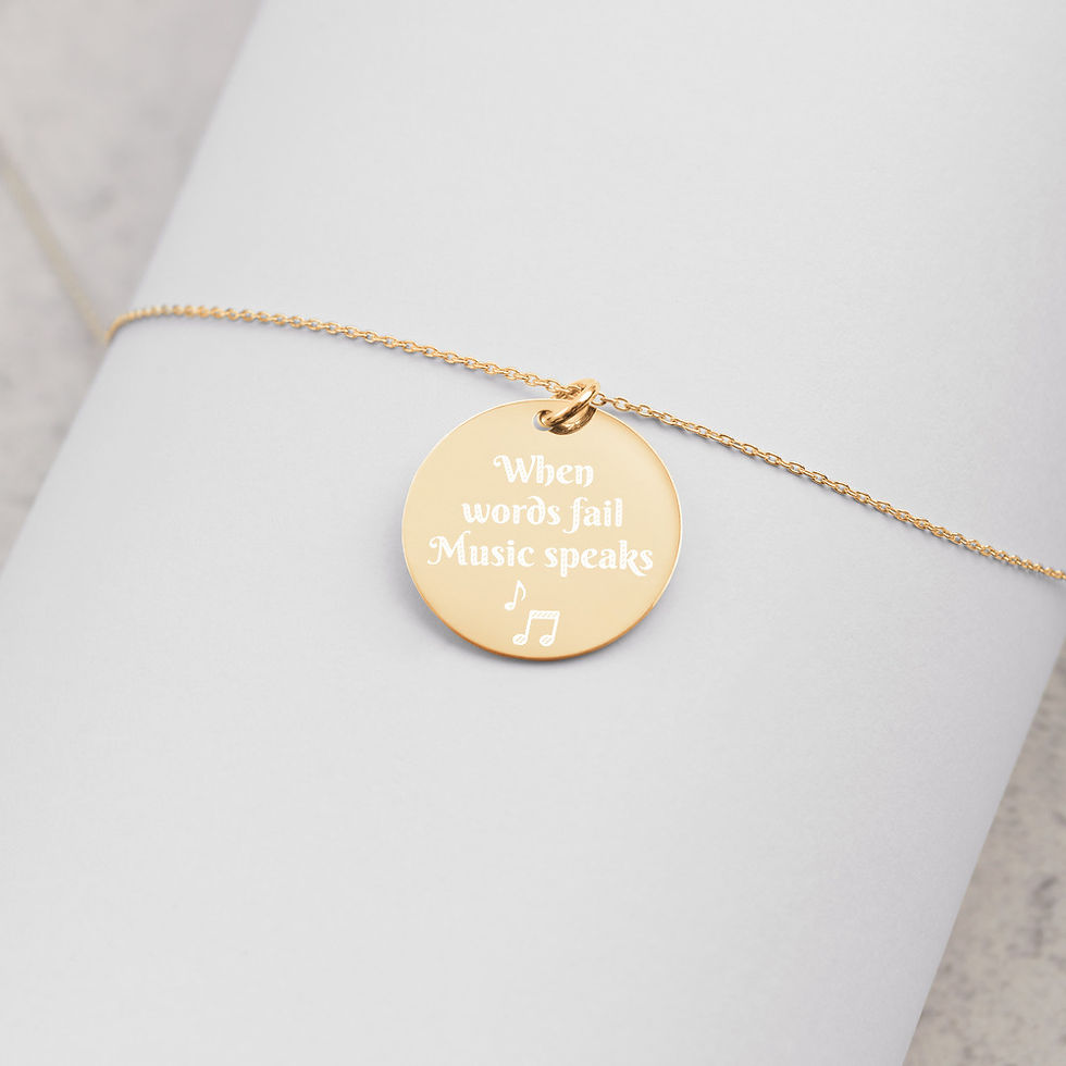 Thumbnail: Engraved Silver Disc Necklace "When words fail Music speaks"