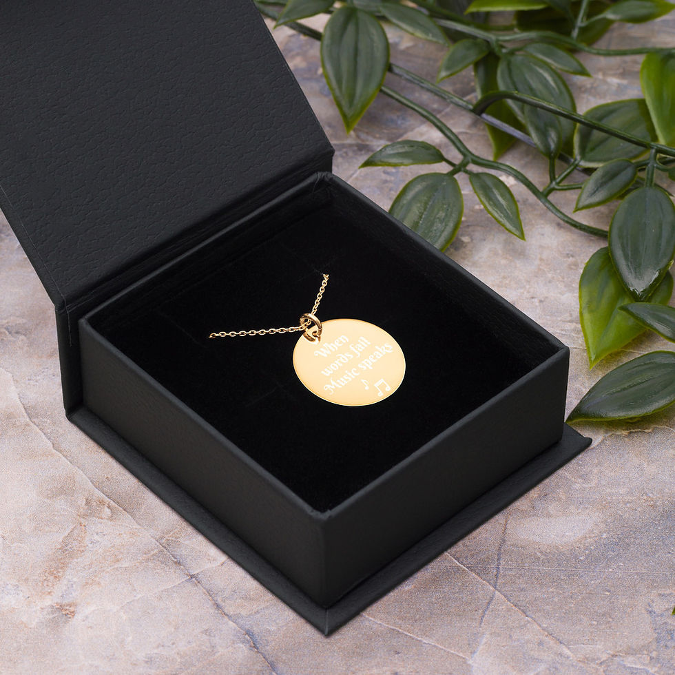 Thumbnail: Engraved Silver Disc Necklace "When words fail Music speaks"